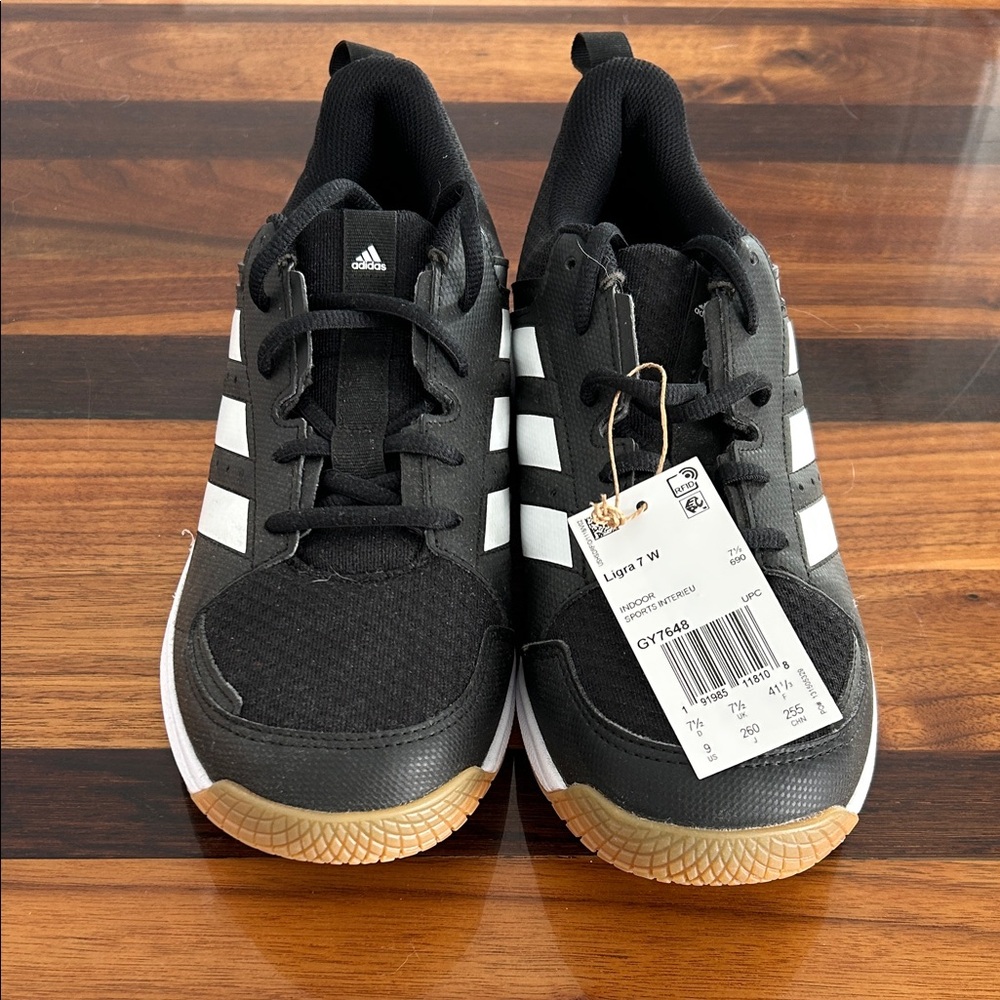 Adidas women’s Black and White Sneakers with Gum Sole